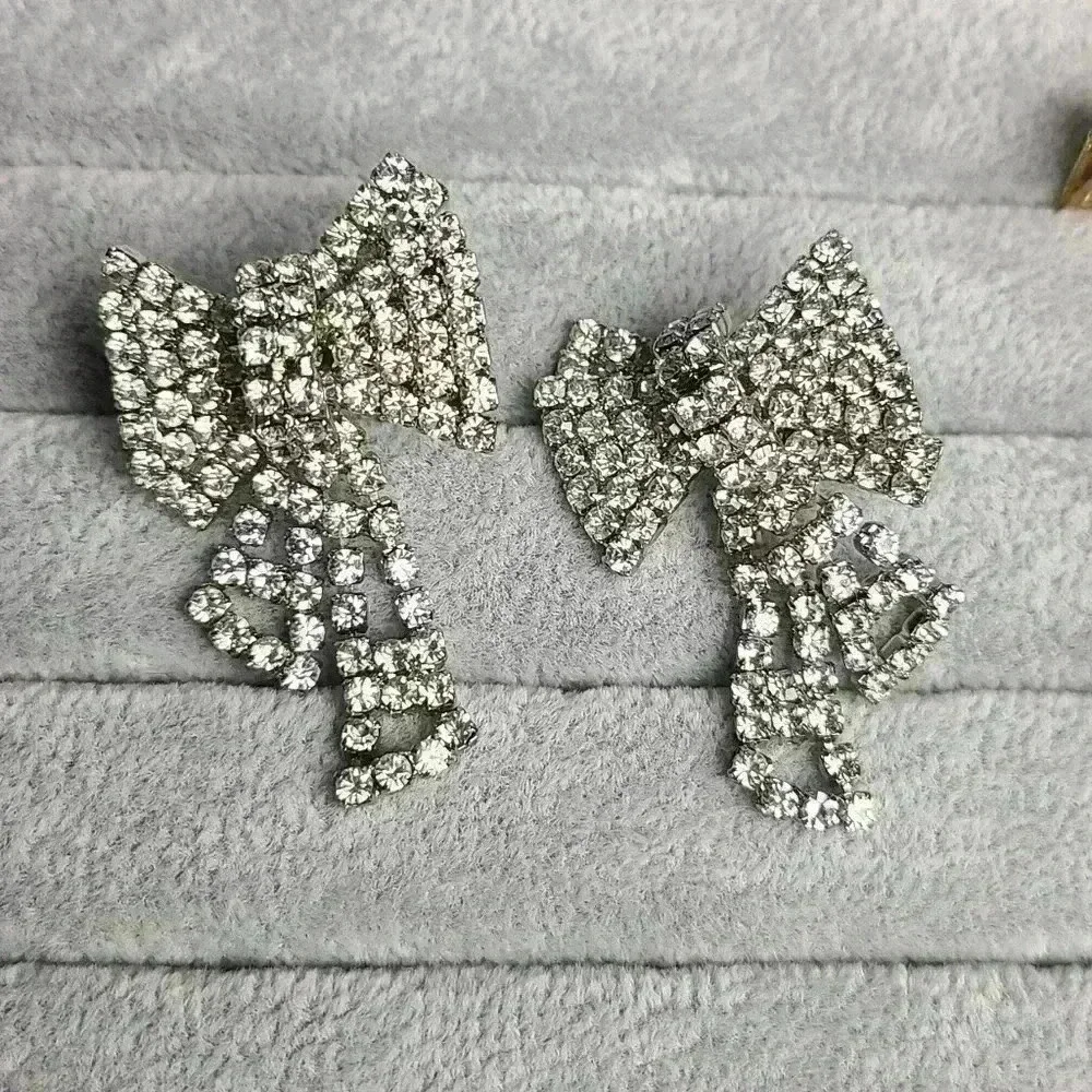 Silver tone clear rhinestones bow earrings - Picture 6 of 17